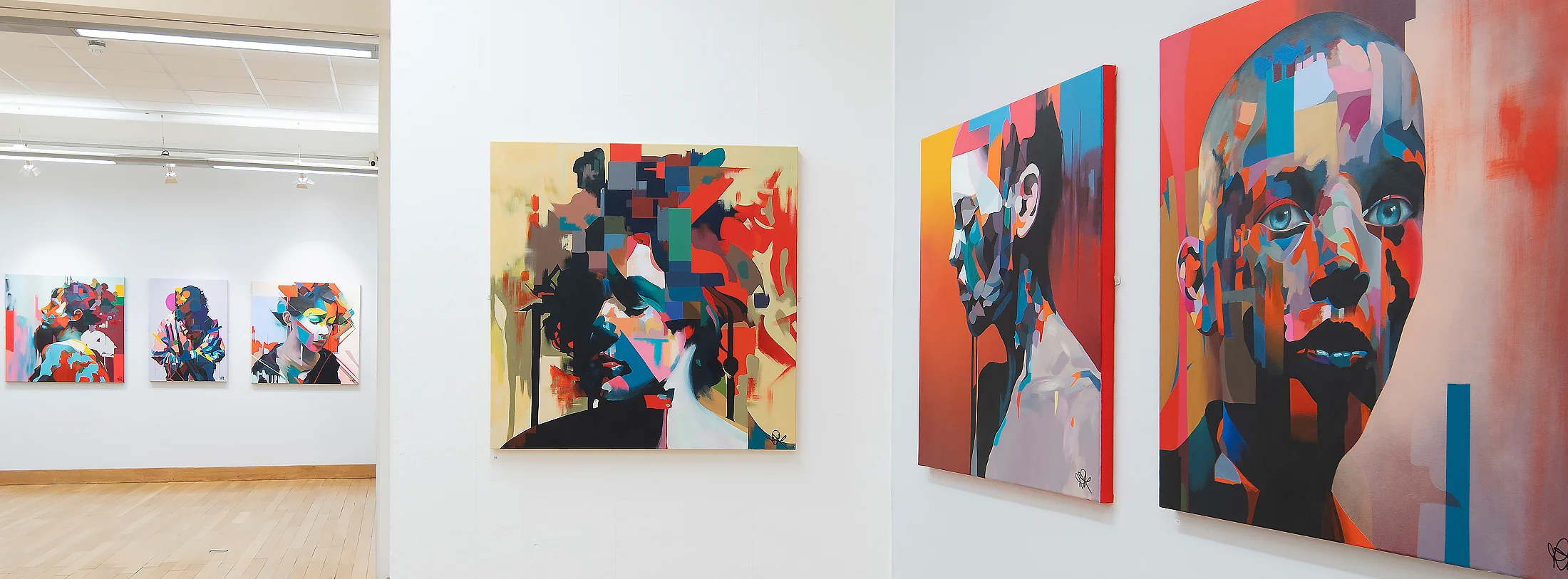 Gallery view of abstract portrait paintings by Paul Kneen at the PAINtings exhibition, Peterborough Museum & Art Gallery
